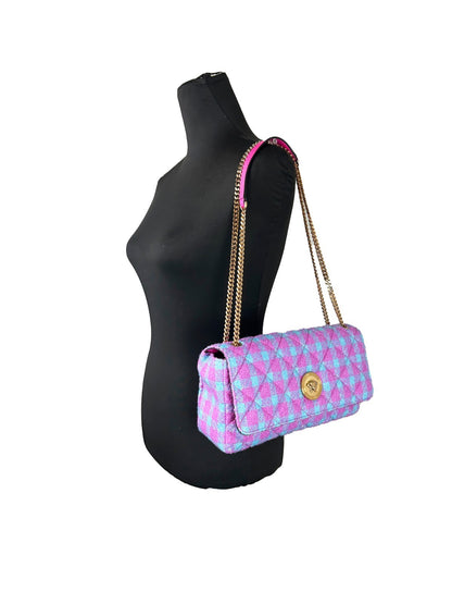 Medium 2-in-1 Shoulder & Crossbody Handbag by Versace for women in leather & lurex gold features a transformative elegance silhouette, showcasing a secure snap & button, organized cardholder, and versatile crossbody-strap & shoulder-strap for a transformative elegance look.