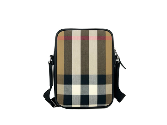 Crossbody Handbag by Burberry for women in canvas silver features a versatile chic silhouette, meticulously detailed with a secure , ample , and versatile crossbody-strap & adjustable-strap.