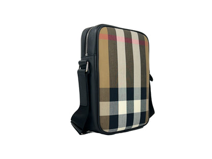 Crossbody Handbag by Burberry for women in canvas silver features a transformative sophistication silhouette, showcasing a secure , ample , and versatile crossbody-strap & adjustable-strap for a transformative sophistication look.