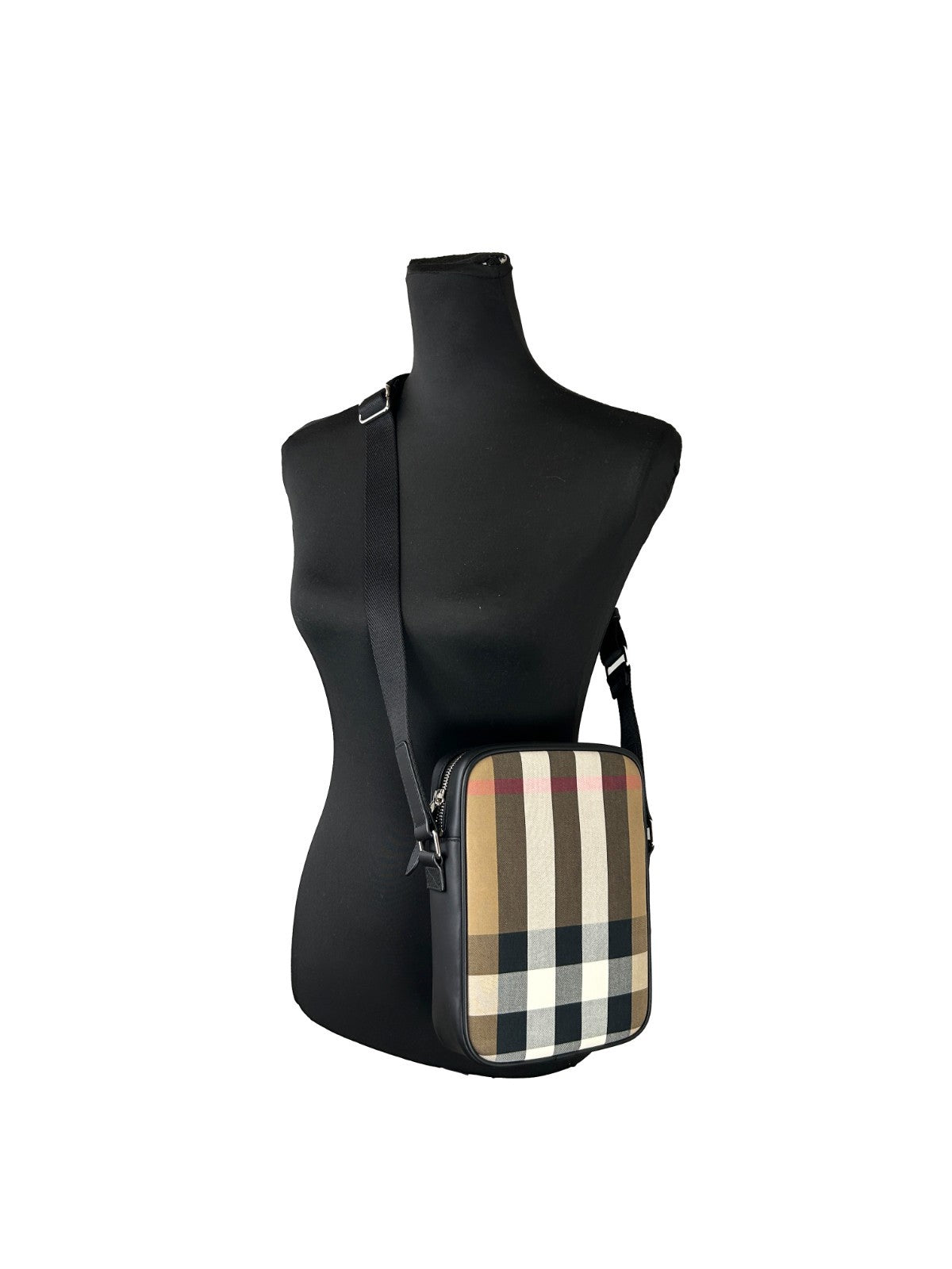 Crossbody Handbag by Burberry for women in canvas silver features an multi-faceted design with a secure , ample , and versatile crossbody-strap & adjustable-strap for a multi-faceted finish.