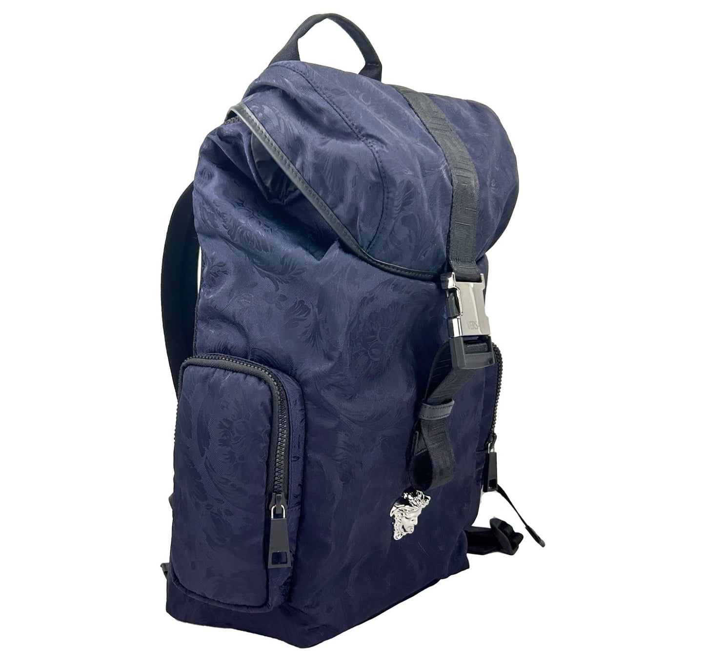 Drawstring Flap Backpack by Versace for women in nylon navy & silver presents a stately Medusa Nylon Drawstring Flap Backpack design, showcasing a secure flap, drawstring & buckle with ample and versatile handle, backpack-strap & adjustable-strap for a stately finish.