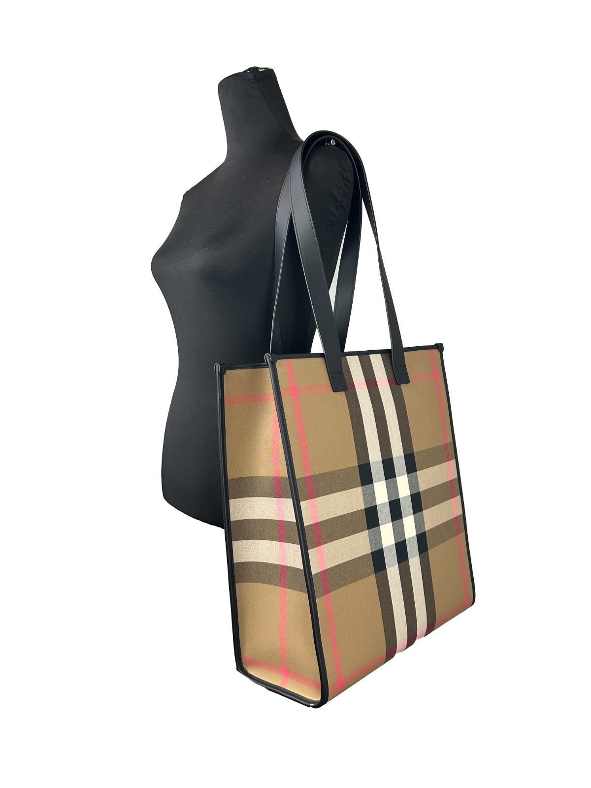 Medium Tote Bag by Burberry for women in canvas silver & print features an jet-setting Canvas Medium Tote Bag design with a secure snap & button, jet-setting , and versatile for a jet-setting look.