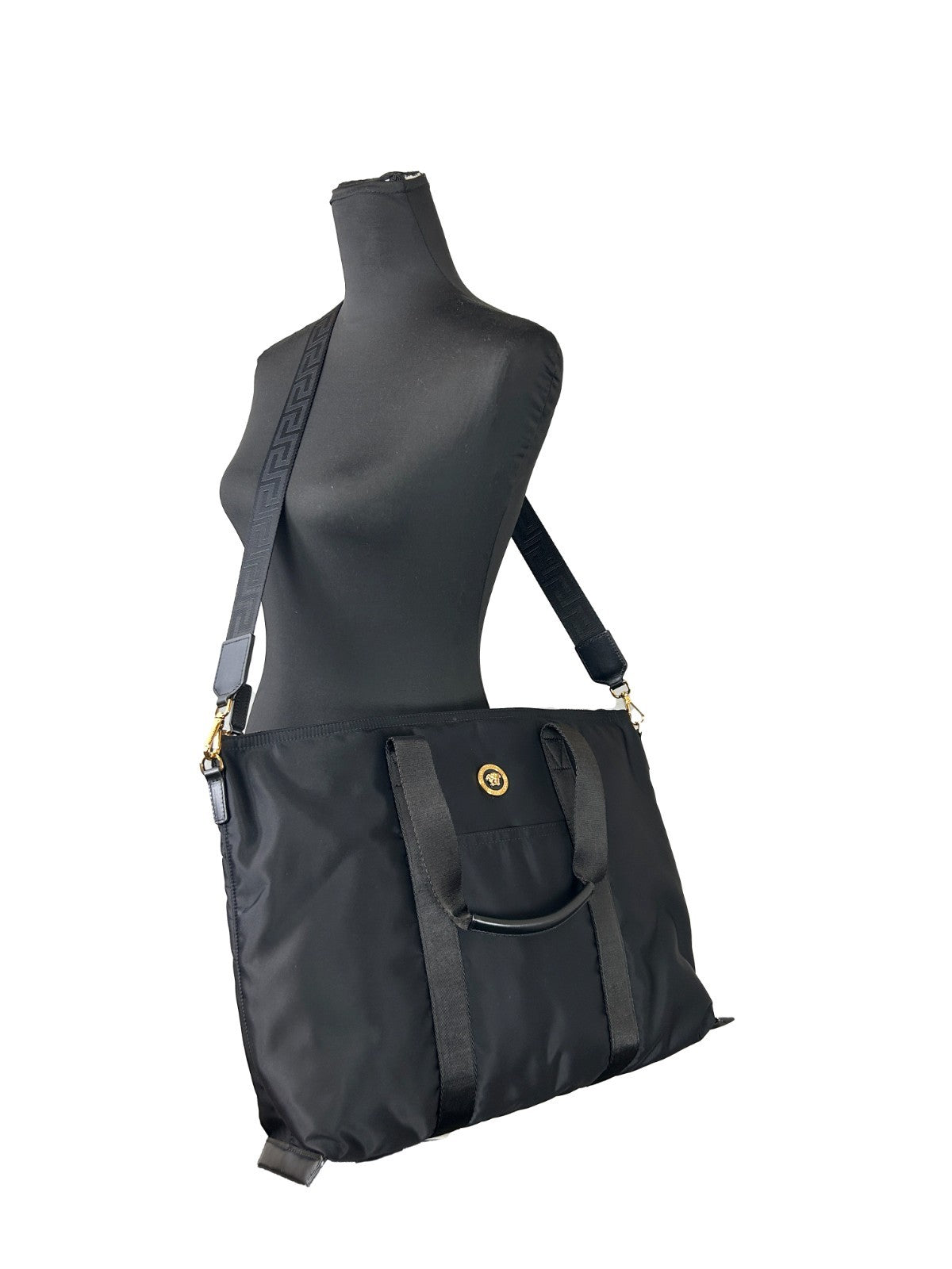 Tote Shoulder Bag by Versace for women in nylon fabric black & gold features a effortless sophistication silhouette, secured by a zipper with ample coin-purse and versatile for a effortless sophistication finish.