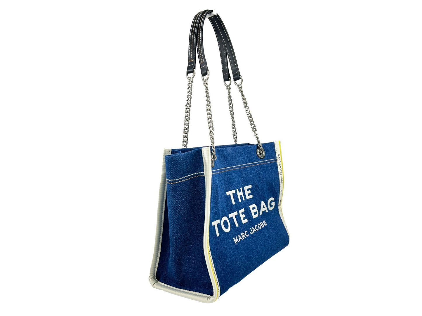 Medium Tote Bag by Marc Jacobs for women in stretch denim & viscose silver features an jet-set The Tote Stretch Denim & Viscose Medium Bag design with a secure zipper, ample , and versatile for an jet-set finish.