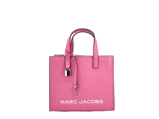 Mini Crossbody Tote Bag by Marc Jacobs for women in faux patent leather pink & silver features a jet-set Mini Grind Faux Patent Leather Crossbody Tote Bag design, complete with a secure zipper, ample , and versatile crossbody-strap, adjustable-strap & detachable-strap for a jet-set look.