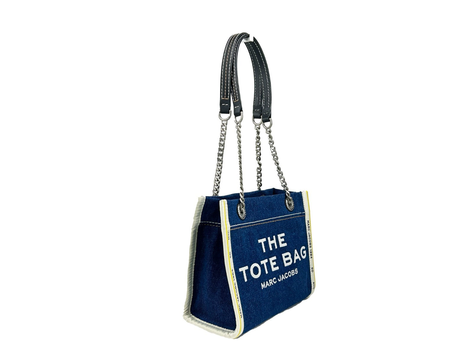 This Tote Bag by Marc Jacobs for women in stretch denim & viscose silver features an jet-set The Tote Stretch Denim & Viscose Bag design with a secure zipper, ample , and jet-set .