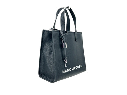 Mini Crossbody Tote Handbag by Marc Jacobs for women in faux patent leather black & silver features an multi-faceted design with a secure zipper, ample , and versatile crossbody-strap, adjustable-strap & detachable-strap for a multi-faceted finish.