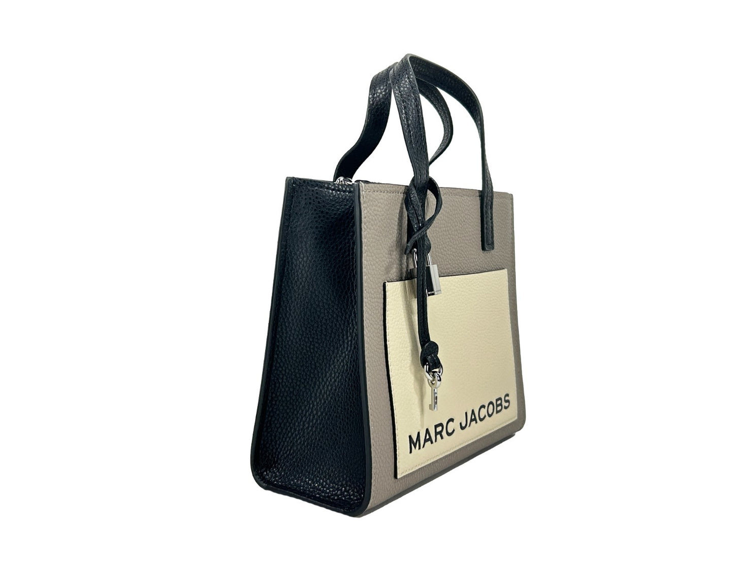 Mini Crossbody Tote Bag by Marc Jacobs for women in faux patent leather silver features a jet-set sophisticated Faux Patent Leather Mini Crossbody Tote Bag design with a secure zipper, ample , and versatile crossbody-strap, adjustable-strap & detachable-strap for a jet-set sophisticated finish.