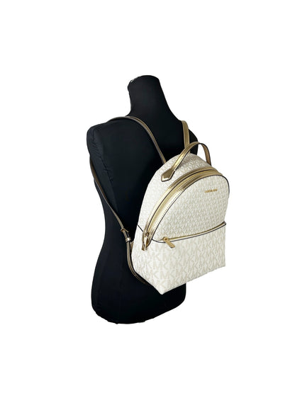 Medium Backpack by Michael Kors for women in faux leather & canvas gold, signature-print & print presents a stately Sheila Faux Leather & Canvas Medium Backpack design, showcasing a secure zipper with ample and versatile backpack-strap & handle for a stately finish.