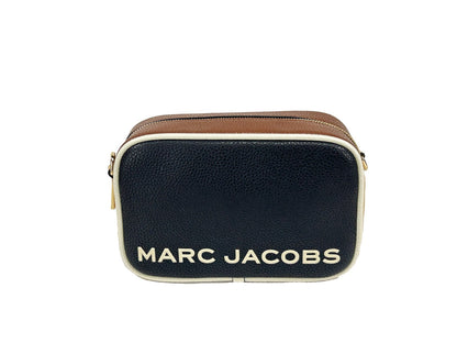 Crossbody Camera Handbag by Marc Jacobs for women in lana wool & denim black & gold features a transformative sophistication silhouette, showcasing a secure zipper, ample cardholder, and versatile crossbody-strap, adjustable-strap & detachable-strap for a transformative sophistication look.