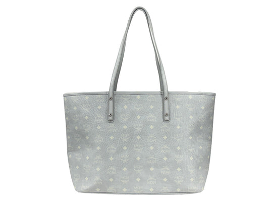 Tote Bag by MCM for women in leather gray, silver, signature-print & print features a jet-set sophisticated Aren Leather Tote Bag design with a secure , ample , and versatile for a jet-set sophisticated finish.