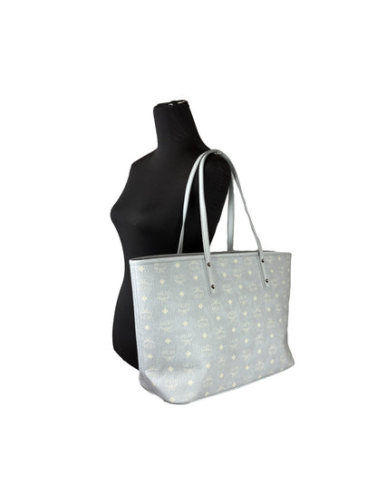 Tote Bag by MCM for women in leather gray, silver, signature-print & print features an jet-setting Aren Leather Tote Bag design with a secure , jet-setting , and versatile for a jet-setting look.