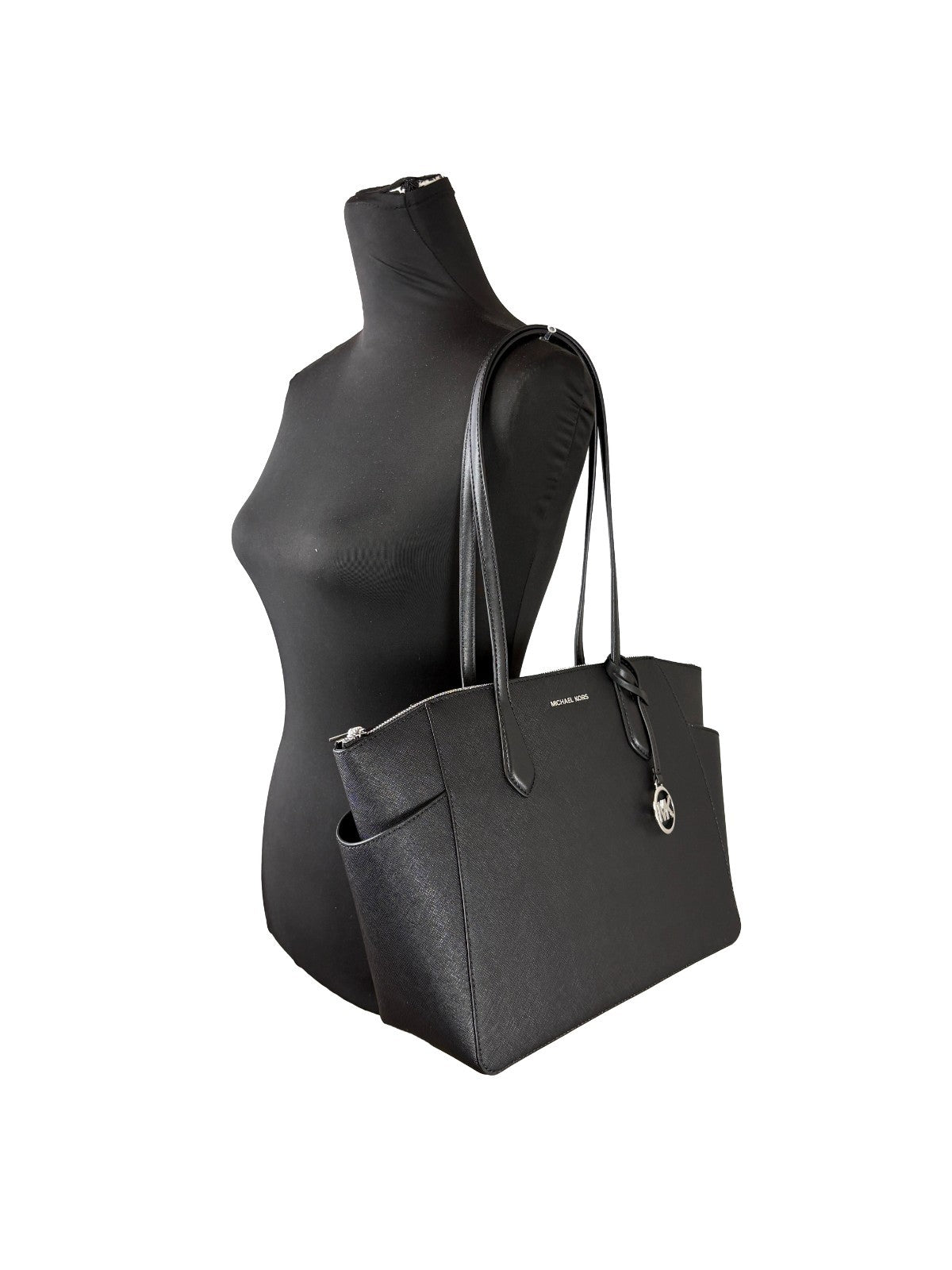 Medium Tote Bag by Michael Kors for women in synthetic polyurethane leather black, silver & signature showcases a statuesque Marilyn Synthetic Polyurethane Leather Medium Tote Bag design, featuring a secure zipper, ample , and versatile for a statuesque finish.