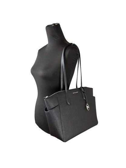 Medium Tote Bag by Michael Kors for women in synthetic polyurethane leather black, silver & signature showcases a statuesque Marilyn Synthetic Polyurethane Leather Medium Tote Bag design, featuring a secure zipper, ample , and versatile for a statuesque finish.