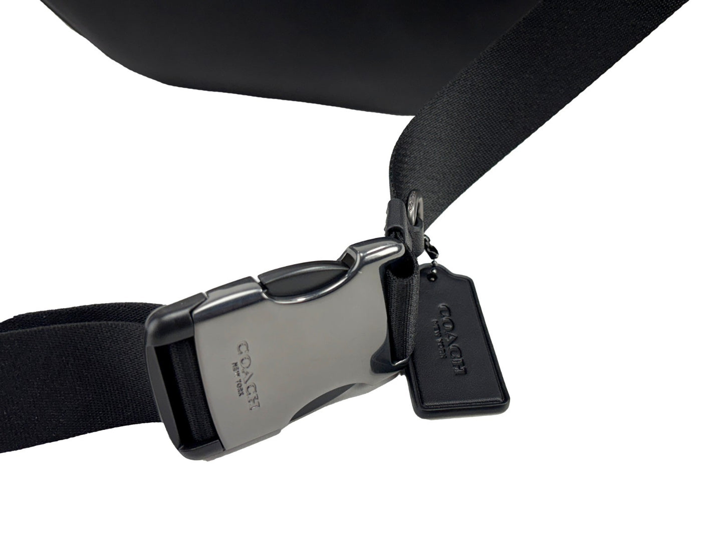 Crossbody Fanny Pack Belt Bag by COACH for women in synthetic polyurethane leather black, charcoal, silver & signature presents a unrivaled Racer Synthetic Polyurethane Leather Crossbody Fanny Pack Belt Bag design, featuring a secure zipper, ample , and versatile crossbody-strap, adjustable-strap & belt-strap for a unrivaled finish.
