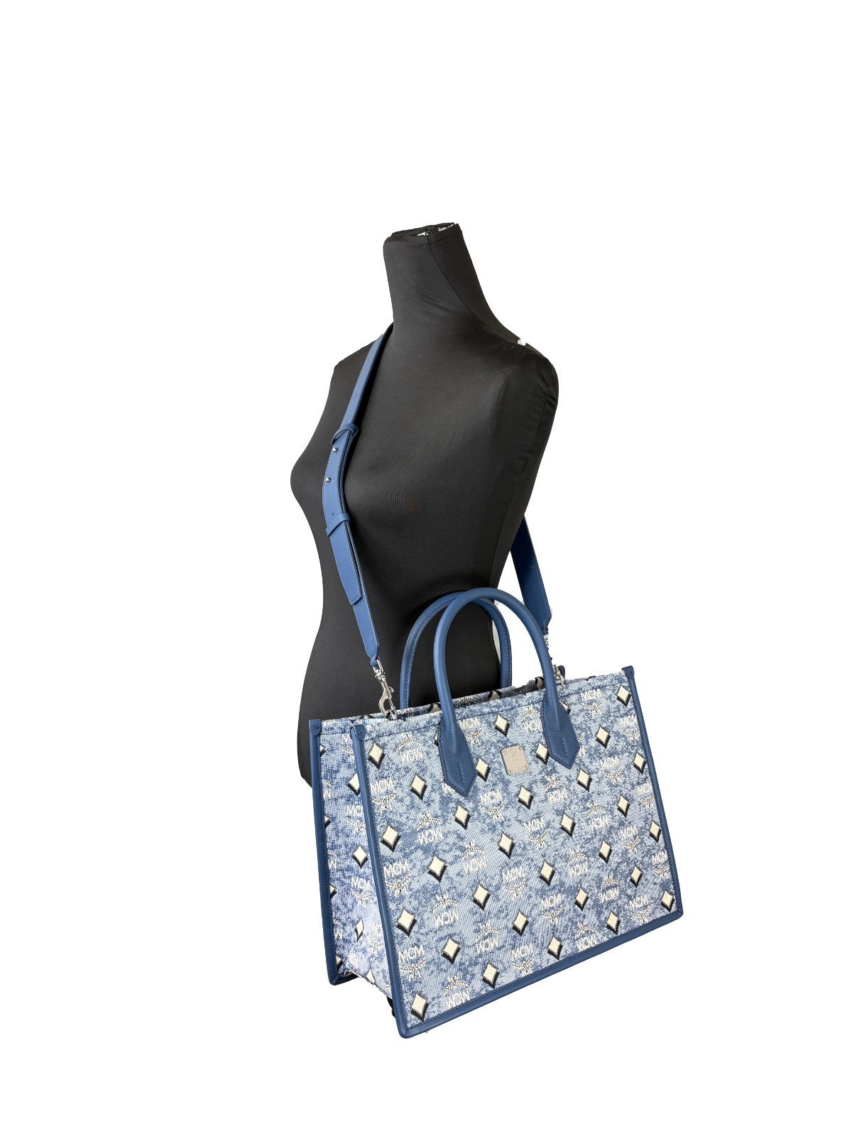 Tote Bag by MCM for women in cotton polyester canvas blue, silver, signature-print & print features an jet-setting Aren Cotton Polyester Canvas Tote Bag design with a secure , jet-setting , and versatile for a jet-setting look.