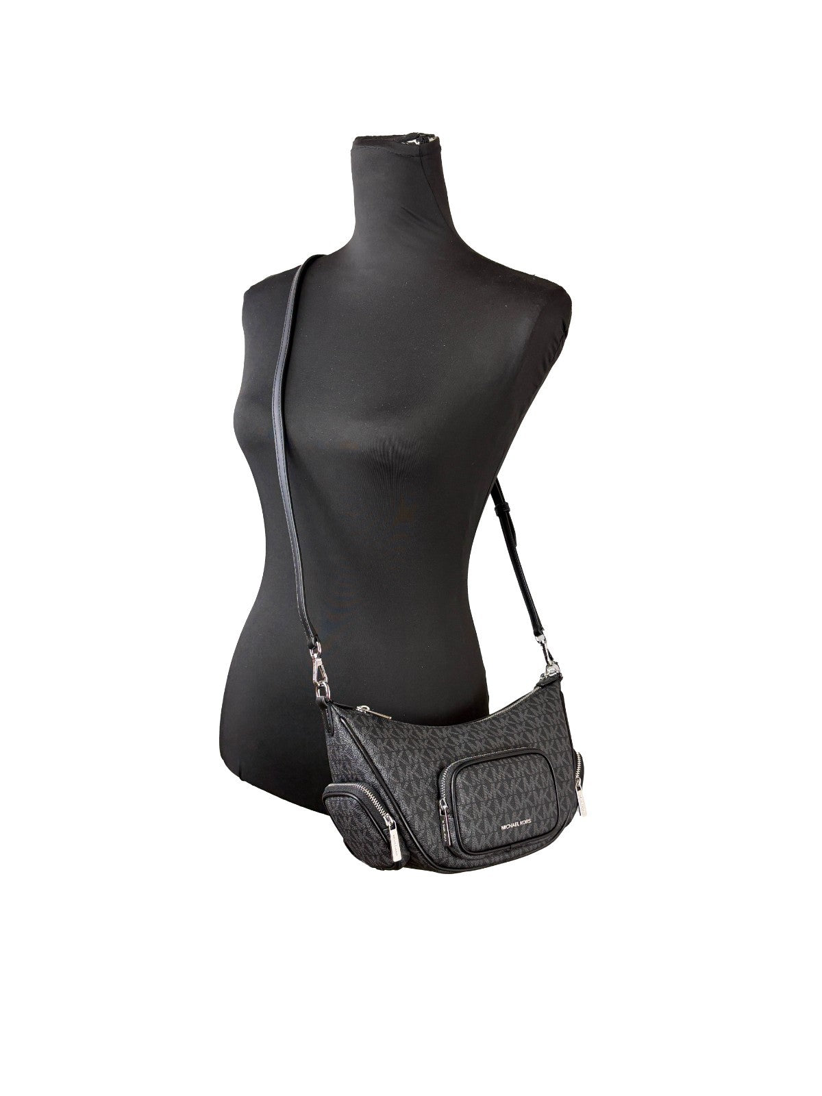 Small Crossbody Handbag by Michael Kors for women in synthetic polyurethane leather black & silver features a multifaceted silhouette, showcasing a secure zipper and multifaceted with versatile crossbody-strap & adjustable-strap for multifaceted style.