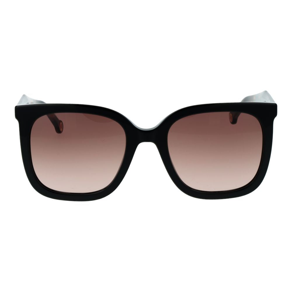 This Sunglasses by Carolina Herrera for women in acetate black presents a sumptuous silhouette, showcasing a sumptuous full-rim square frame design in black coloured frame and high-performance gradient category-2-medium-tint lens.