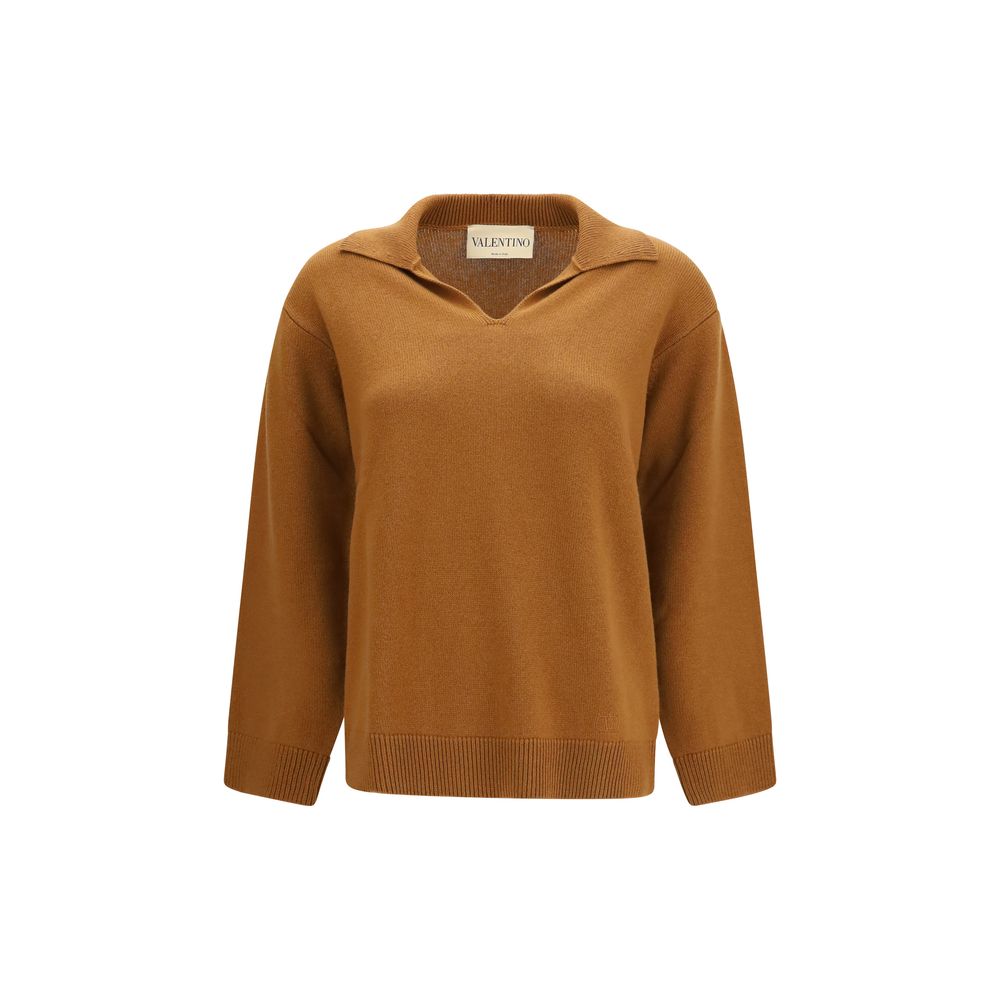Sweater by Valentino Garavani for women in cashmere & capra leather brown showcases a sumptuous silhouette, artfully finished with a sumptuous v-neck neckline and long-sleeve for a sophisticated, sumptuous look.