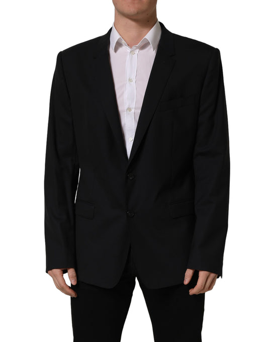 This Blazer by Dolce & Gabbana for men in virgin wool viscose & cupro black presents a tailored silhouette, meticulously tailored with a tailored wrap single-breasted neckline and distinctive for a tailored finish.