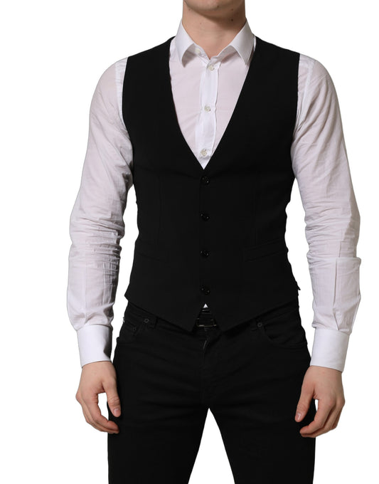 Vest by Dolce & Gabbana for men in virgin wool & silk black features a stylish silhouette, showcasing distinct and a refined wrap single-breasted neckline for a truly stylish finish.