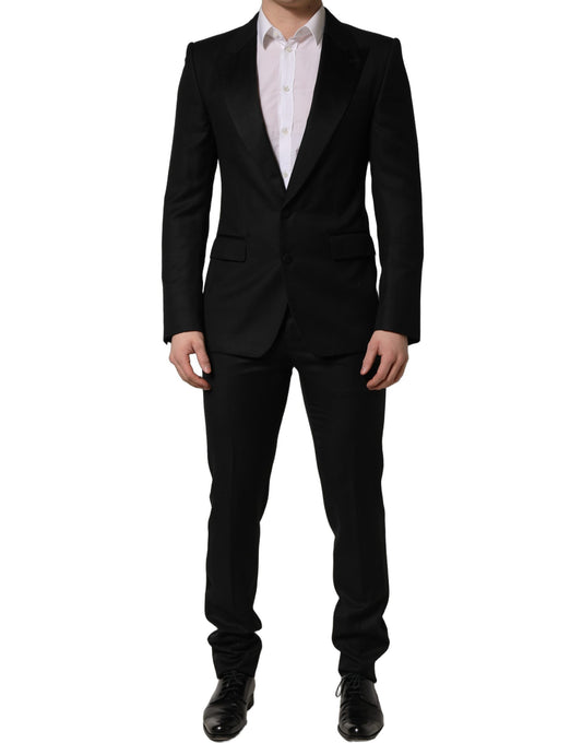 Pant Suit by Dolce & Gabbana for men in virgin wool silk & viscose black presents a nuanced silhouette, showcasing a nuanced wrap single-breasted neckline and nuanced slim for an elevated aesthetic.