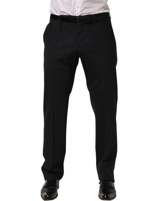 Trousers by Dolce & Gabbana for men in virgin wool viscose & cupro black presents a perennial silhouette, meticulously tailored with a tapered-leg cut, long finish, and an elegant .