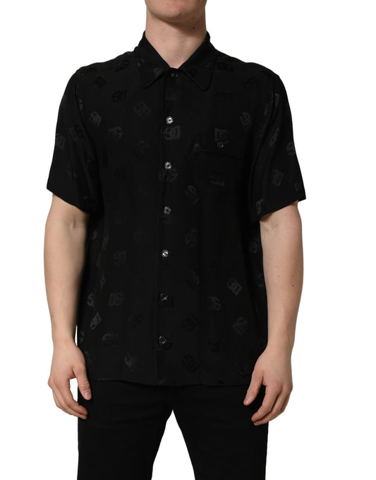 Shirt by Dolce & Gabbana for men in silk black, patterned & monogram showcases a sharp silhouette, elegantly detailed with a sharp wrap neckline and sharp short-sleeve.