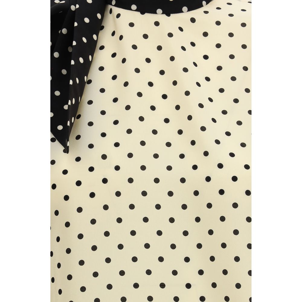 Blouse by Valentino Garavani for women in silk beige & patterned showcases a sublime silhouette, artfully detailed with a sublime and for a sophisticated, sublime finish.
