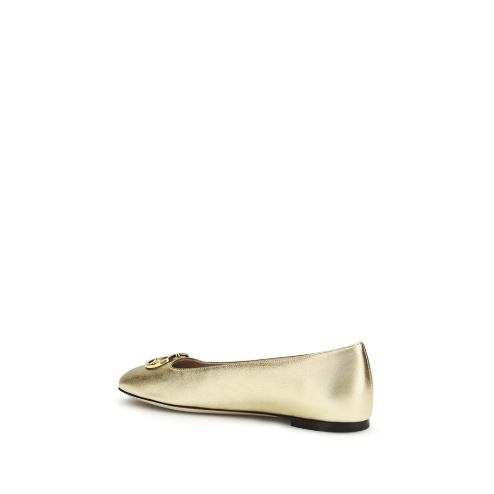 Ballet Flat Shoes by Valentino Garavani for women in bos taurus nappa calf leather gold & signature features an captivating silhouette, showcasing the captivating style of the V Logo Women's Bos Taurus Nappa Calf Leather Ballet Flat Shoes with its distinct and refined .