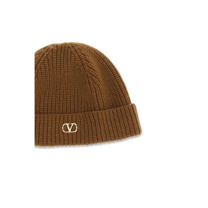 Beanie Hat by Valentino Garavani for men in cashmere & capra leather brown & gold presents a urban-chic silhouette, showcasing the urban-chic craftsmanship of this V Logo Cashmere & Capra Leather Beanie Hat.
