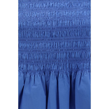Blouse by Ganni for women in stretch cotton blue showcases a sleek silhouette, elegantly detailed with a sleek round neckline and for a sleek finish.