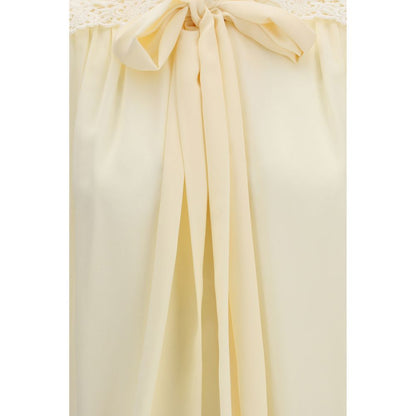 Blouse by Chloé for women in polyester beige showcases a sleek silhouette, elegantly detailed with a sleek and for a sleek finish.