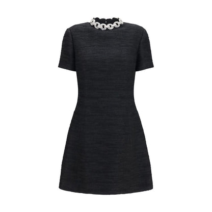 Dress by Valentino Garavani for women in polyamide cotton viscose & crystal black presents a sinuous silhouette, showcasing a sophisticated crew neckline and short-sleeve detailed with a sinuous midi for a refined finish.