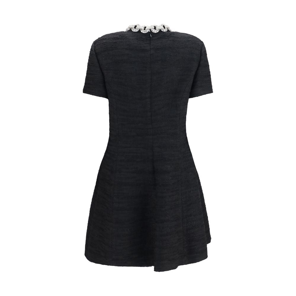 Dress by Valentino Garavani for women in polyamide cotton viscose & crystal black showcases a striking silhouette, elegantly detailed with a , refined crew neckline, and a striking midi for a striking finish.