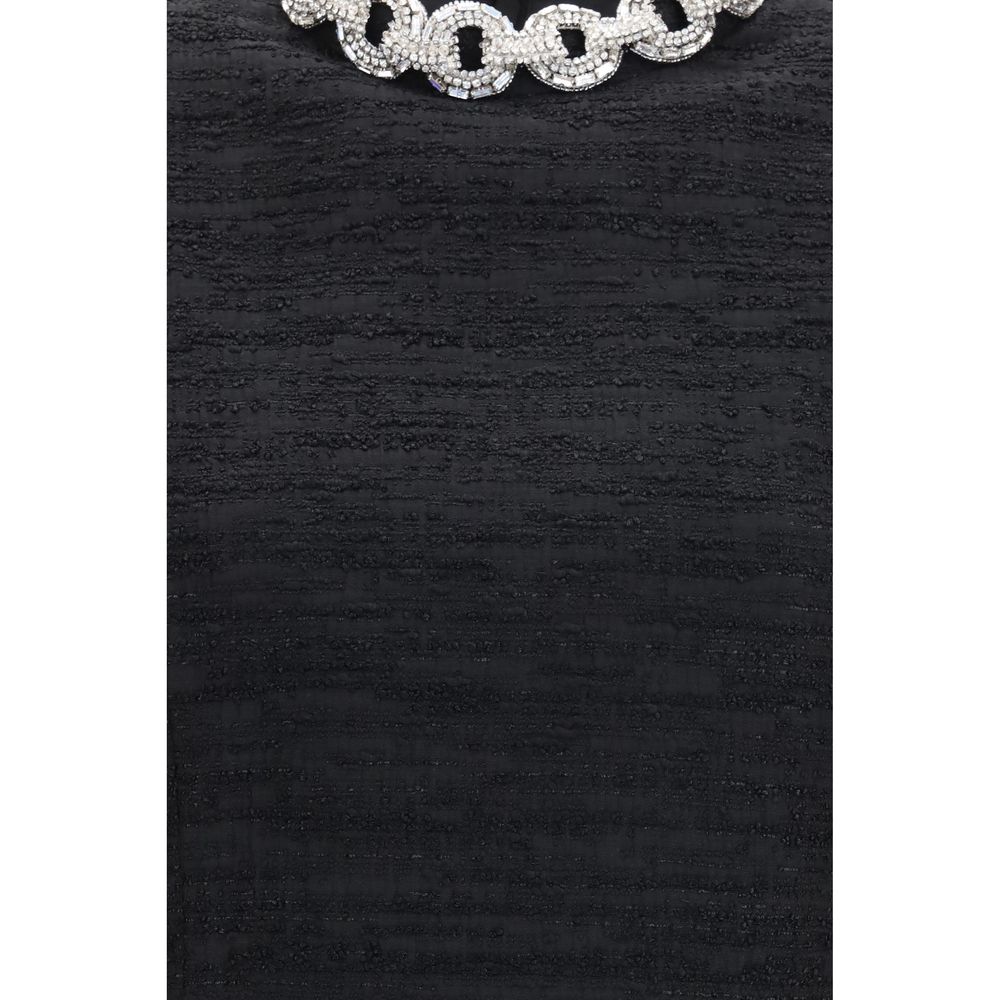 Dress by Valentino Garavani for women in polyamide cotton viscose & crystal black features an magnificent silhouette, artfully detailed with a magnificent and that flows into an magnificent midi.