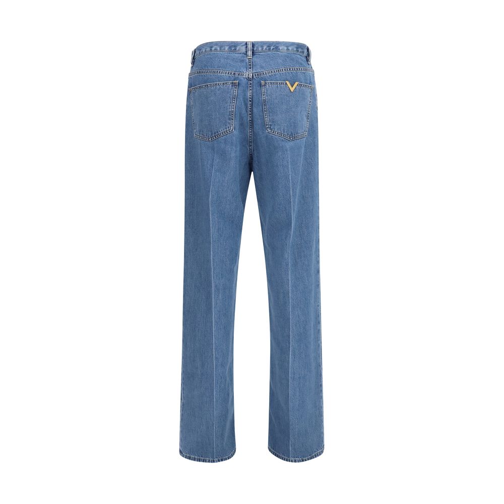 Jeans by Valentino Garavani for men in denim cotton blue features a polished silhouette with a polished straight-leg & regular-fit, reaching a polished long and finished with a polished .