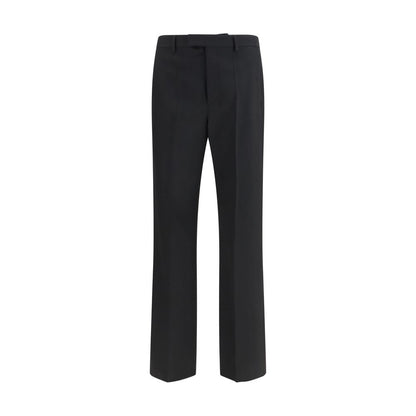 Trousers by Valentino Garavani for men in merino wool black features an sartorial silhouette, showcasing a precise regular-fit and long with a sartorial for a refined look.