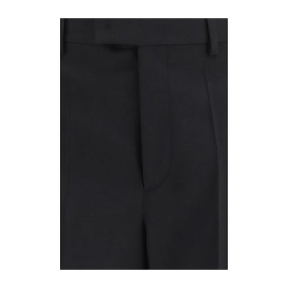 Trousers by Valentino Garavani for men in merino wool black features a artisanal silhouette, showcasing a sophisticated regular-fit with a long and for a artisanal finish.