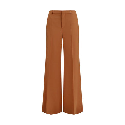 Trousers by Chloé for women in cotton orange features a tailored silhouette with a tailored flared & regular-fit, defined by its long and a sophisticated high rise.