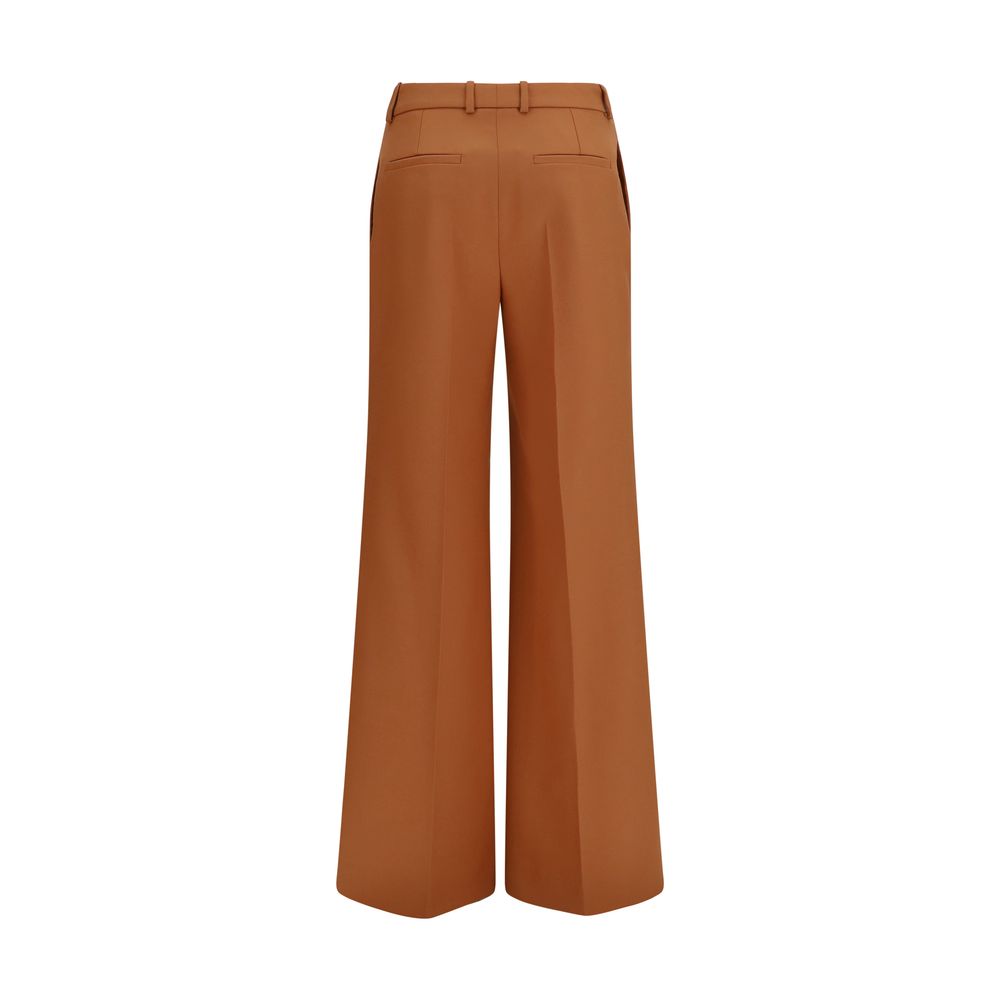 Trousers by Chloé for women in cotton orange features a sculptural silhouette, showcasing a sculptural flared & regular-fit and long with a sophisticated high rise for a sculptural finish.