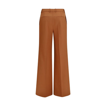 Trousers by Chloé for women in cotton orange features a sculptural silhouette, showcasing a sculptural flared & regular-fit and long with a sophisticated high rise for a sculptural finish.