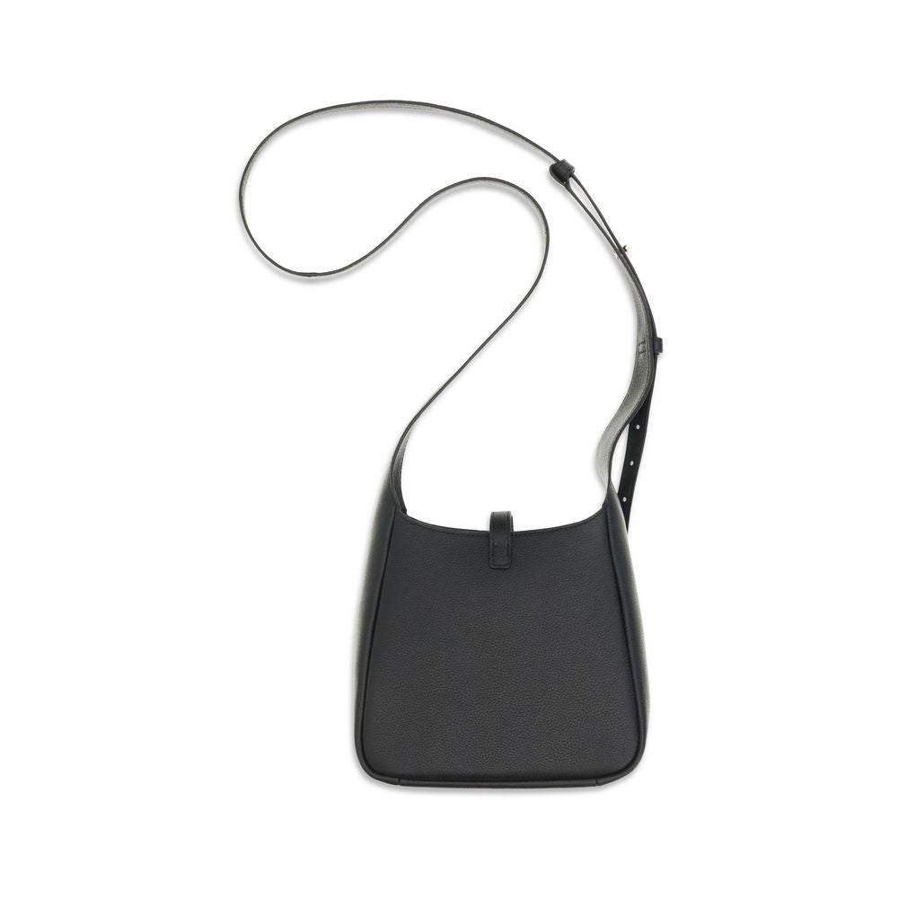 2-in-1 Shoulder & Crossbody Bag by Tory Burch for women in bos taurus calf nappa & pebbled leather black features a enviable silhouette, showcasing a secure snap, ample internal-pockets, and enviable crossbody-strap, shoulder-strap & adjustable-strap for a enviable finish.