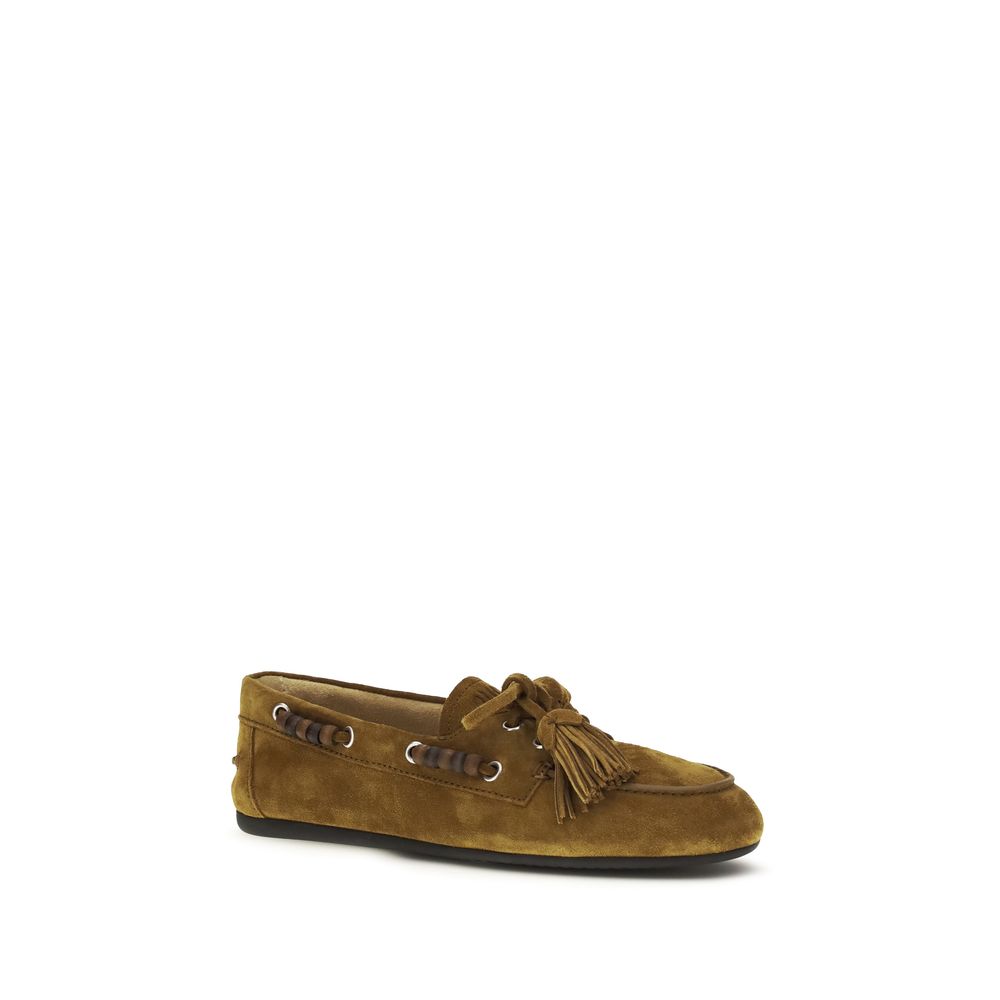 This Flat Boat Loafer Slip-On Shoes by Miu Miu for women in bos taurus calf suede leather beige features an exquisite silhouette from the Women's Bos Taurus Calf Suede Leather Flat Boat Loafer Slip-On Shoes collection, defined by a sophisticated flat and elegant .