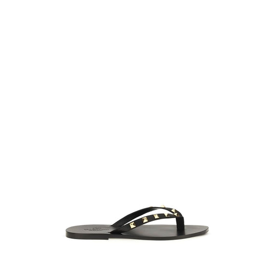 Flip-Flop Thong Sandals by Valentino Garavani for men in bos taurus calfskin leather black presents a sculptural silhouette, showcasing the Rockstud Men's Bos Taurus Calfskin Leather Flip-Flop Thong Sandals design with a sculptural and for a premium look.