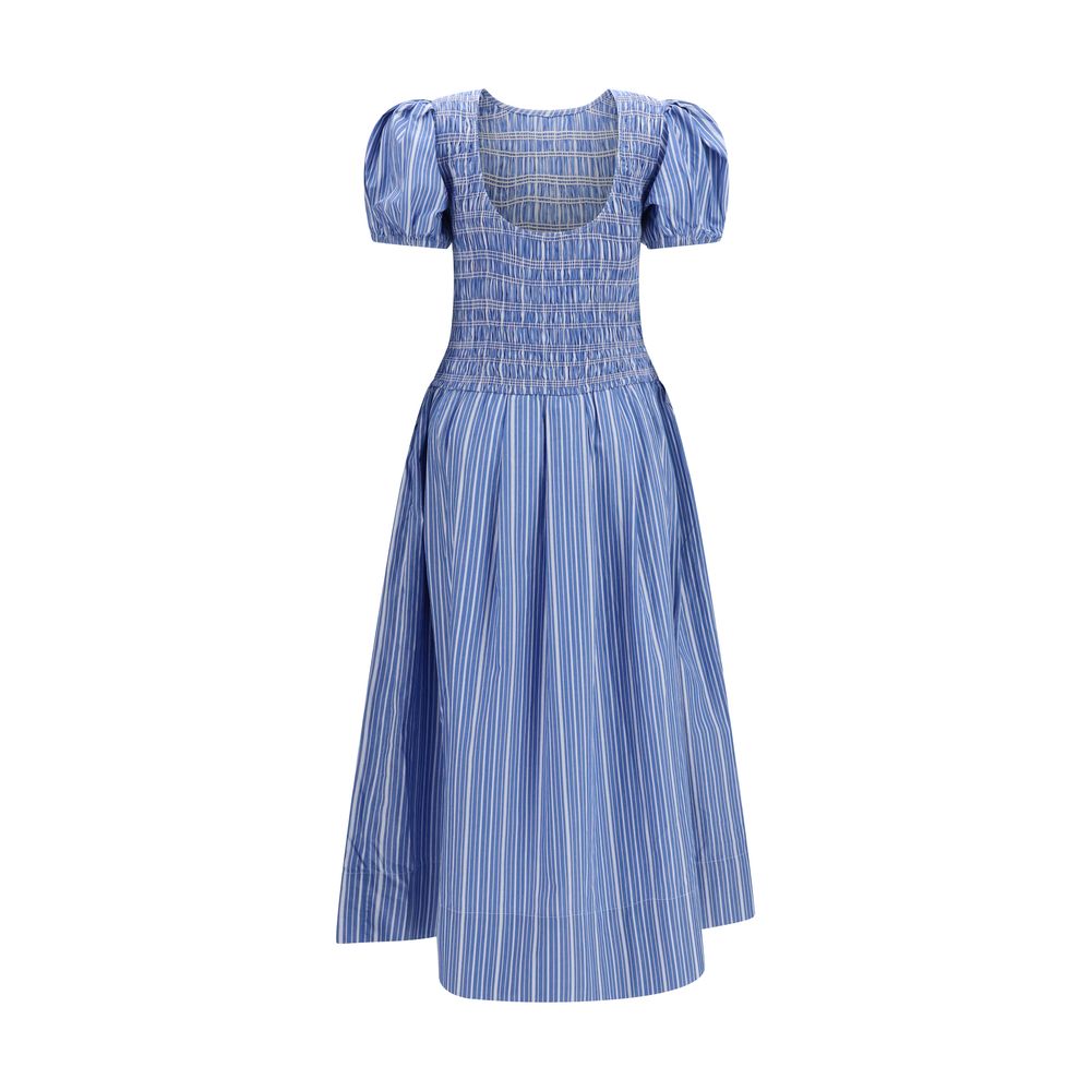 Dress by Ganni for women in cotton blue, patterned & striped features a dramatic silhouette, showcasing an elegant and that flows into a dramatic midi knee short.