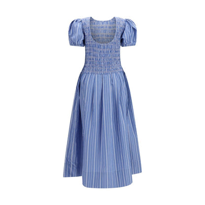 Dress by Ganni for women in cotton blue, patterned & striped features a dramatic silhouette, showcasing an elegant and that flows into a dramatic midi knee short.