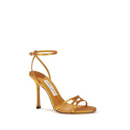 Stiletto Ankle Strap Sandals by Jimmy Choo for women in silk satin orange features an effortlessly chic silhouette from the Women's Silk Satin Stiletto Ankle Strap Sandals collection, showcasing a effortlessly chic stiletto and elegant .