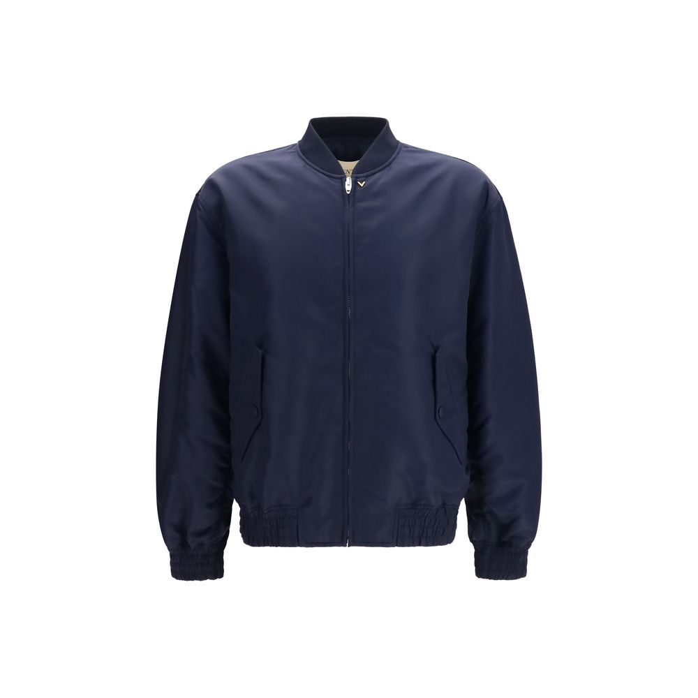 This Bomber Jacket by Valentino Garavani for men in nylon blue & gold exhibits a edgy silhouette, meticulously detailed with functional pockets and a edgy for a edgy finish.