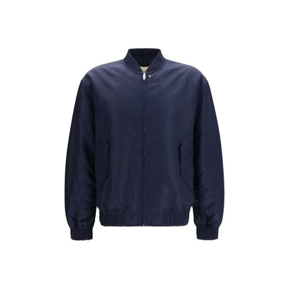 This Bomber Jacket by Valentino Garavani for men in nylon blue & gold exhibits a edgy silhouette, meticulously detailed with functional pockets and a edgy for a edgy finish.